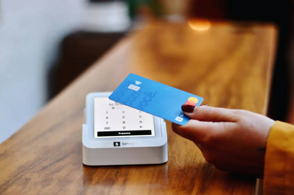 Blog author reviewing credit card benefits on laptop